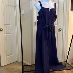 Lane Bryant size 22 navy blue sleeveless jumpsuit with a belt.